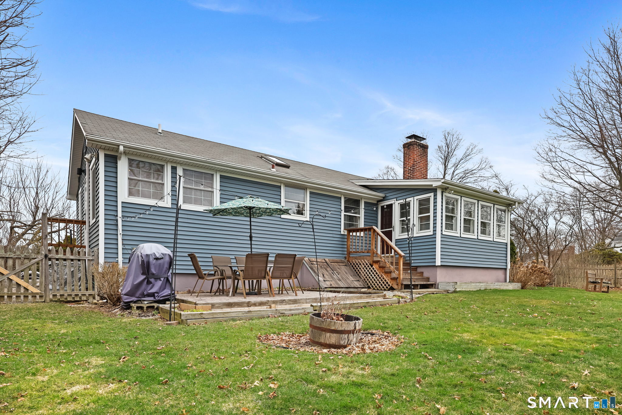 19 Lyncrest Drive Norwalk, CT 06851 - Photo 32 of 41 a view of a house with backyard sitting area and garden