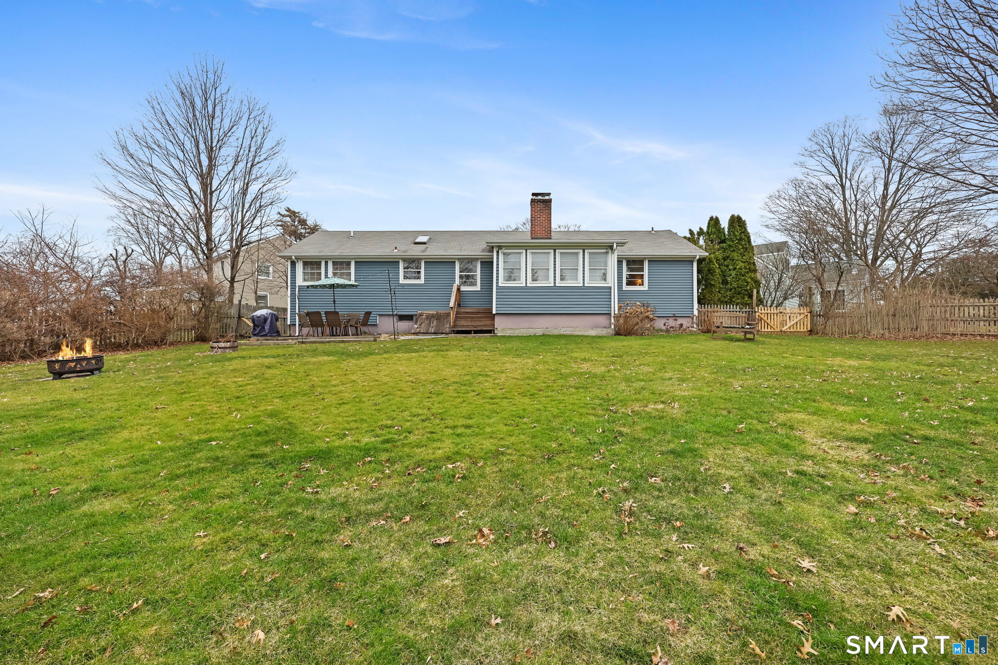 19 Lyncrest Drive Norwalk, CT 06851 - Photo 33 of 41 a view of a house with a big yard and large trees
