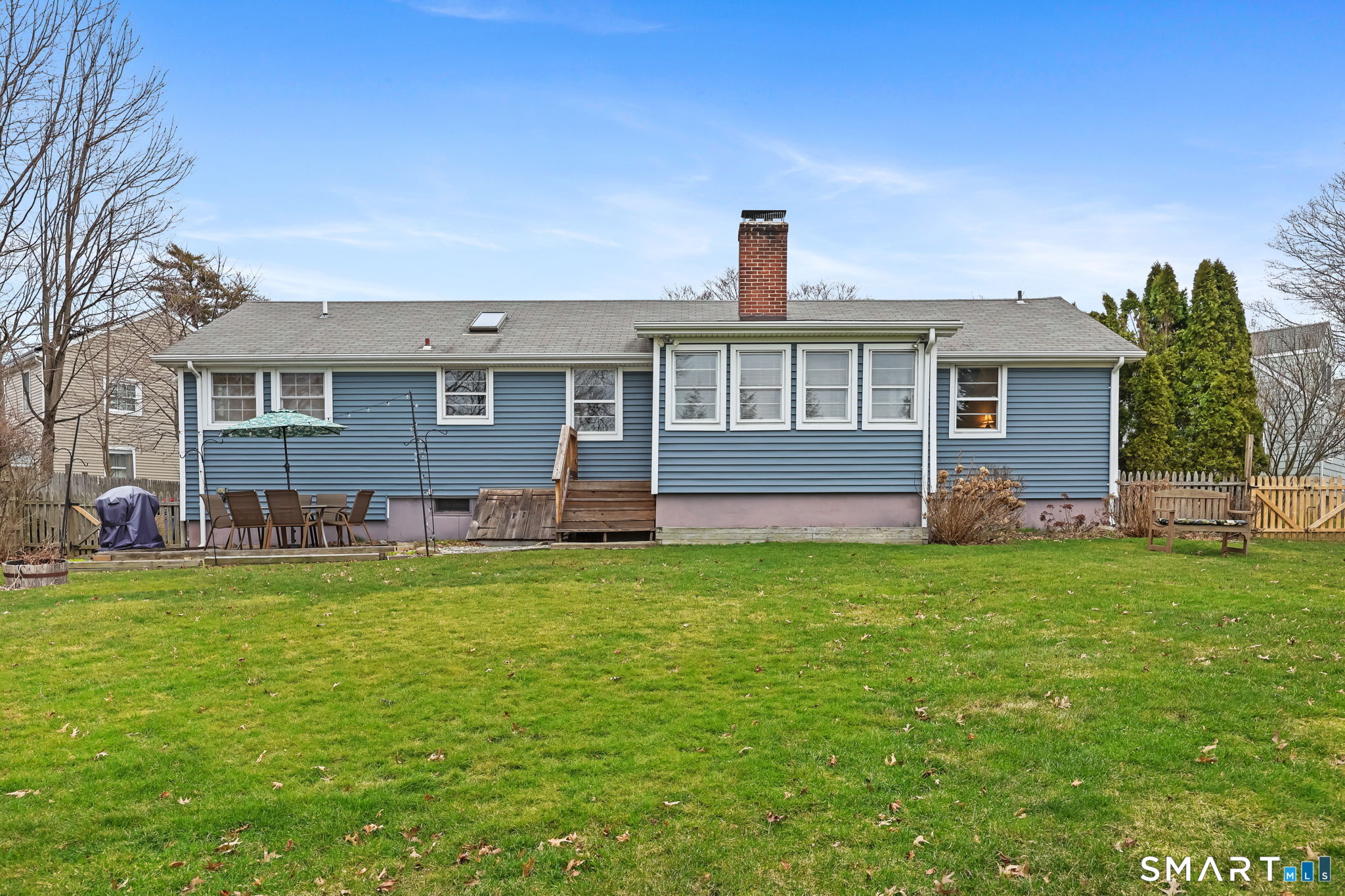 19 Lyncrest Drive Norwalk, CT 06851 - Photo 34 of 41 a front view of a house with a garden