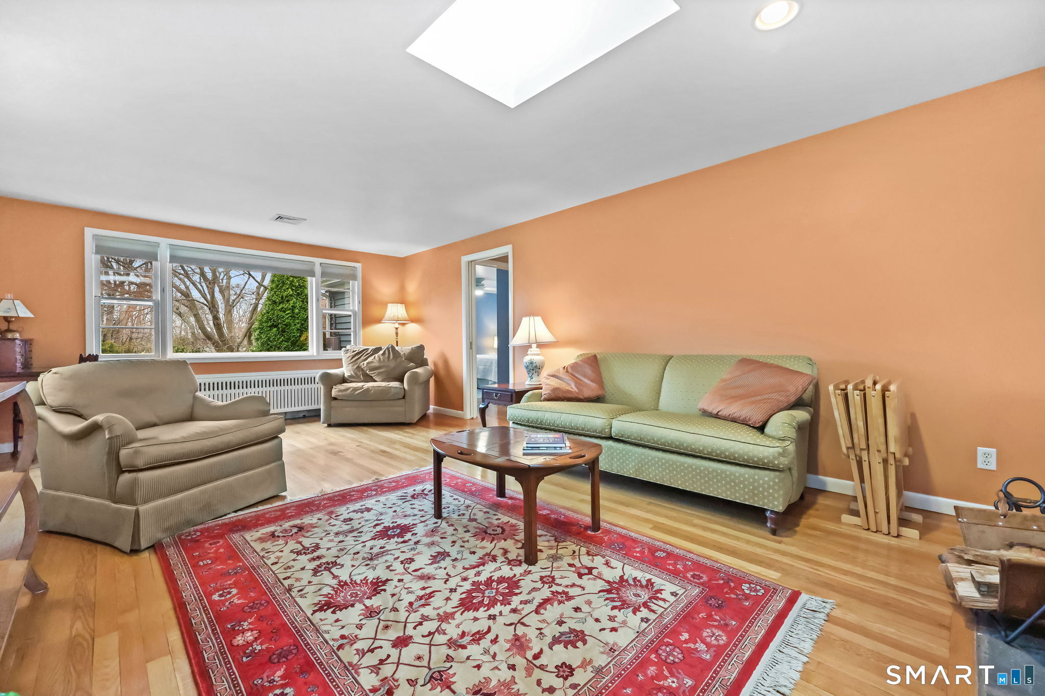 19 Lyncrest Drive Norwalk, CT 06851 - Photo 9 of 41 a living room with furniture and a rug
