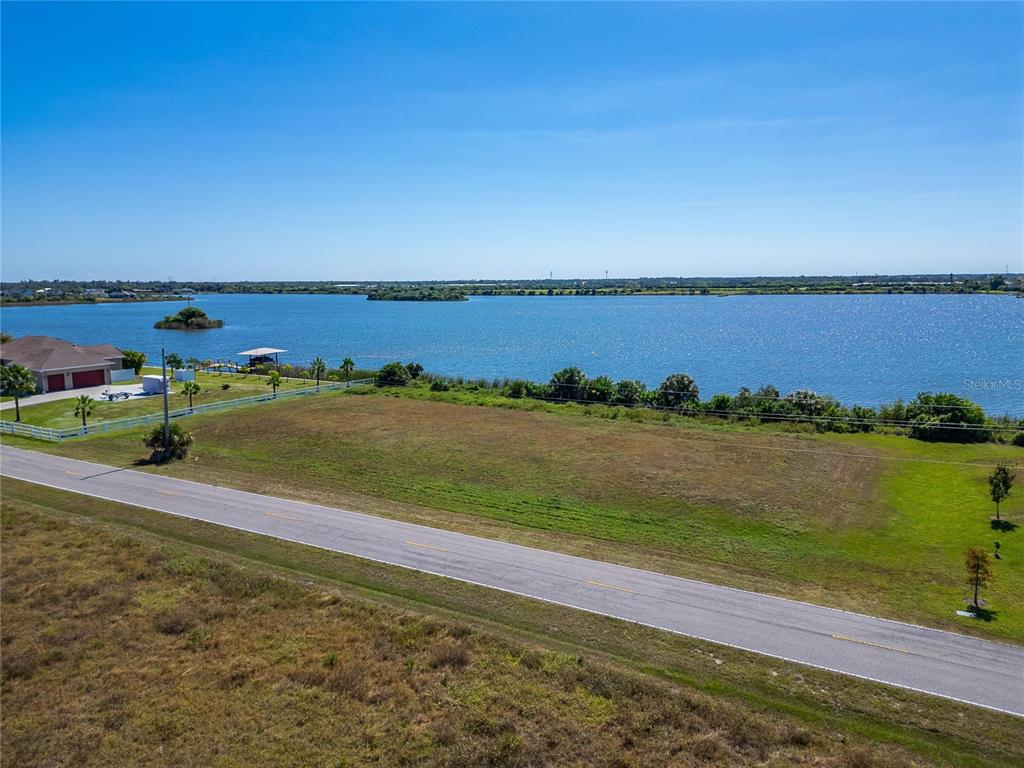 Gulf City Road Ruskin, FL 33570 - Photo 5 of 43 a view of a lake with a yard
