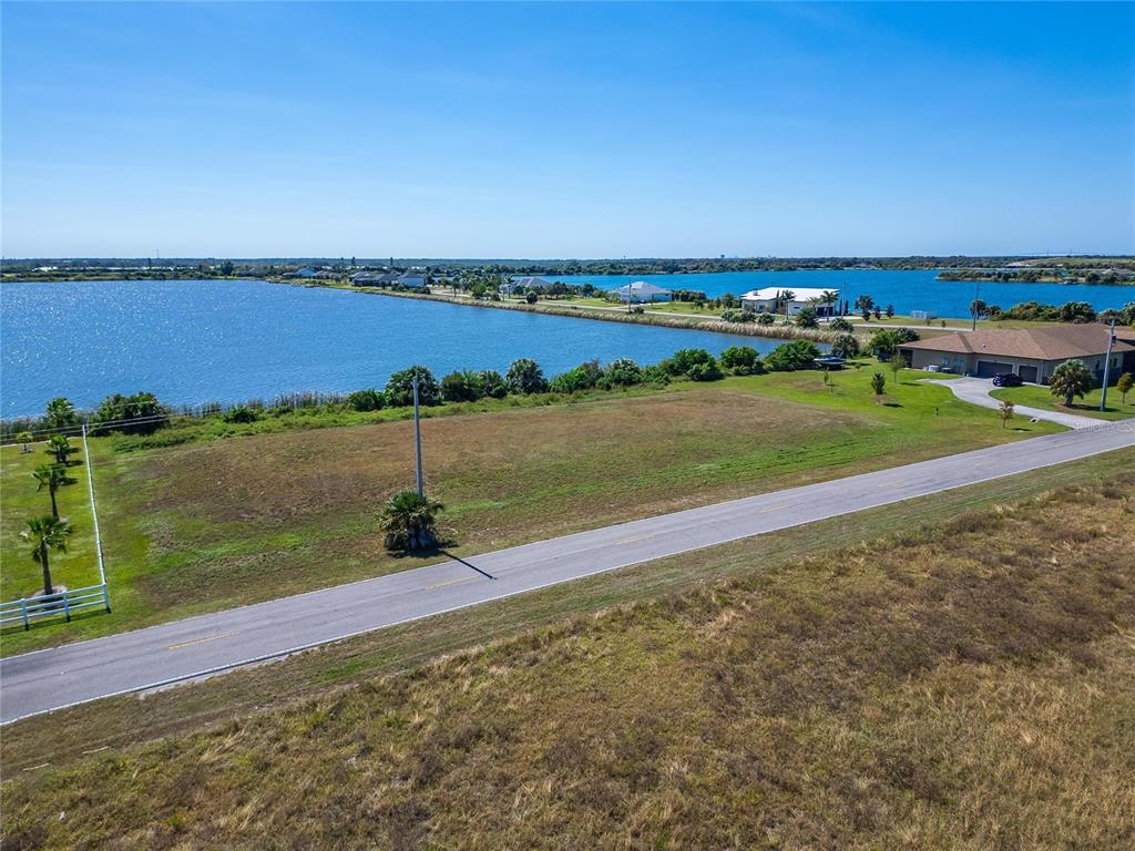 Gulf City Road Ruskin, FL 33570 - Photo 8 of 43 a view of a lake with houses in the back