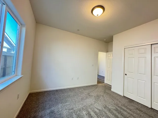 a kitchen with granite countertop white cabinets and a granite counter tops