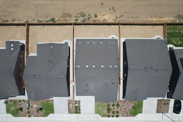 an aerial view of a house having patio