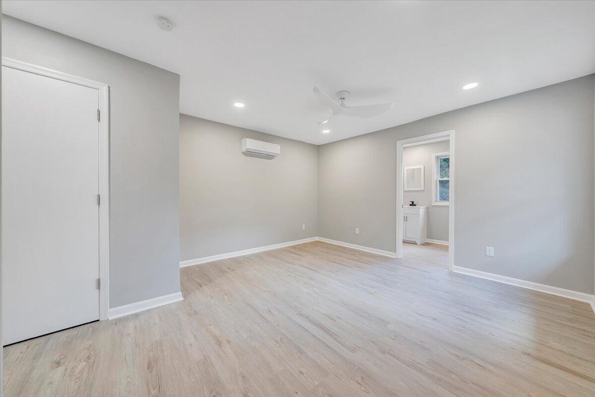 8633 Grassy Hill Road Boones Mill, VA 24065 - Photo 15 of 33 a view of an empty room with wooden floor