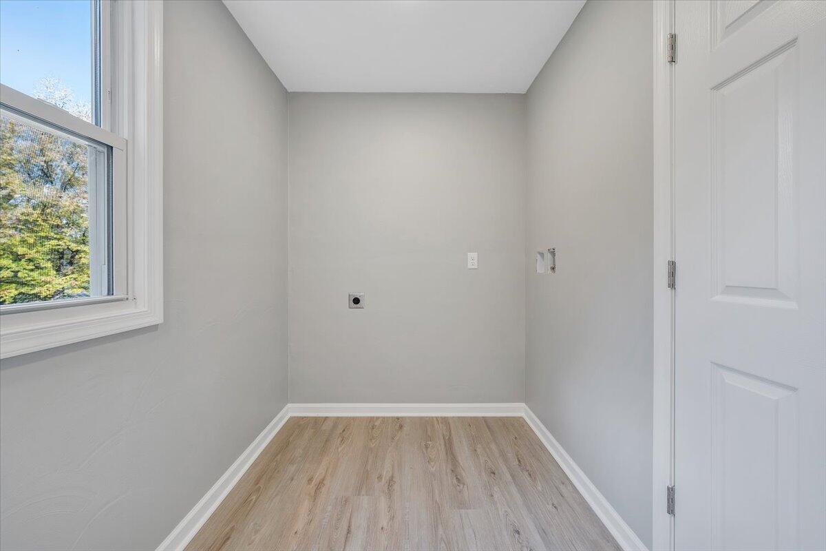 8633 Grassy Hill Road Boones Mill, VA 24065 - Photo 26 of 33 a view of a small space with wooden floor and a window