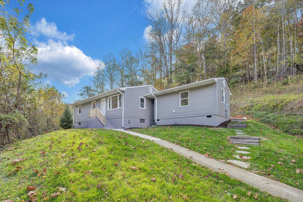 8633 Grassy Hill Road Boones Mill, VA 24065 - Photo 29 of 33 a view of a back yard of the house