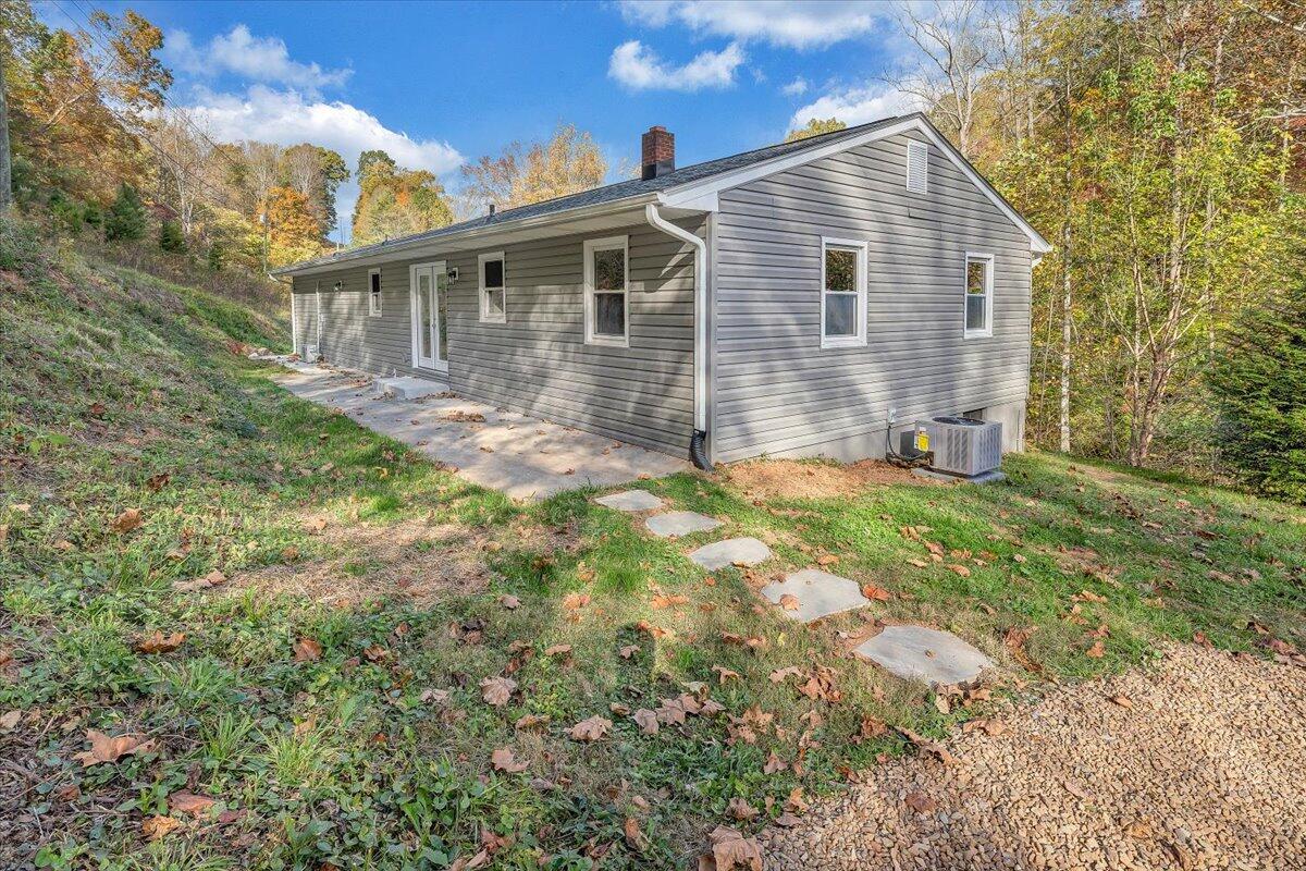 8633 Grassy Hill Road Boones Mill, VA 24065 - Photo 30 of 33 a view of a house with yard and sitting area