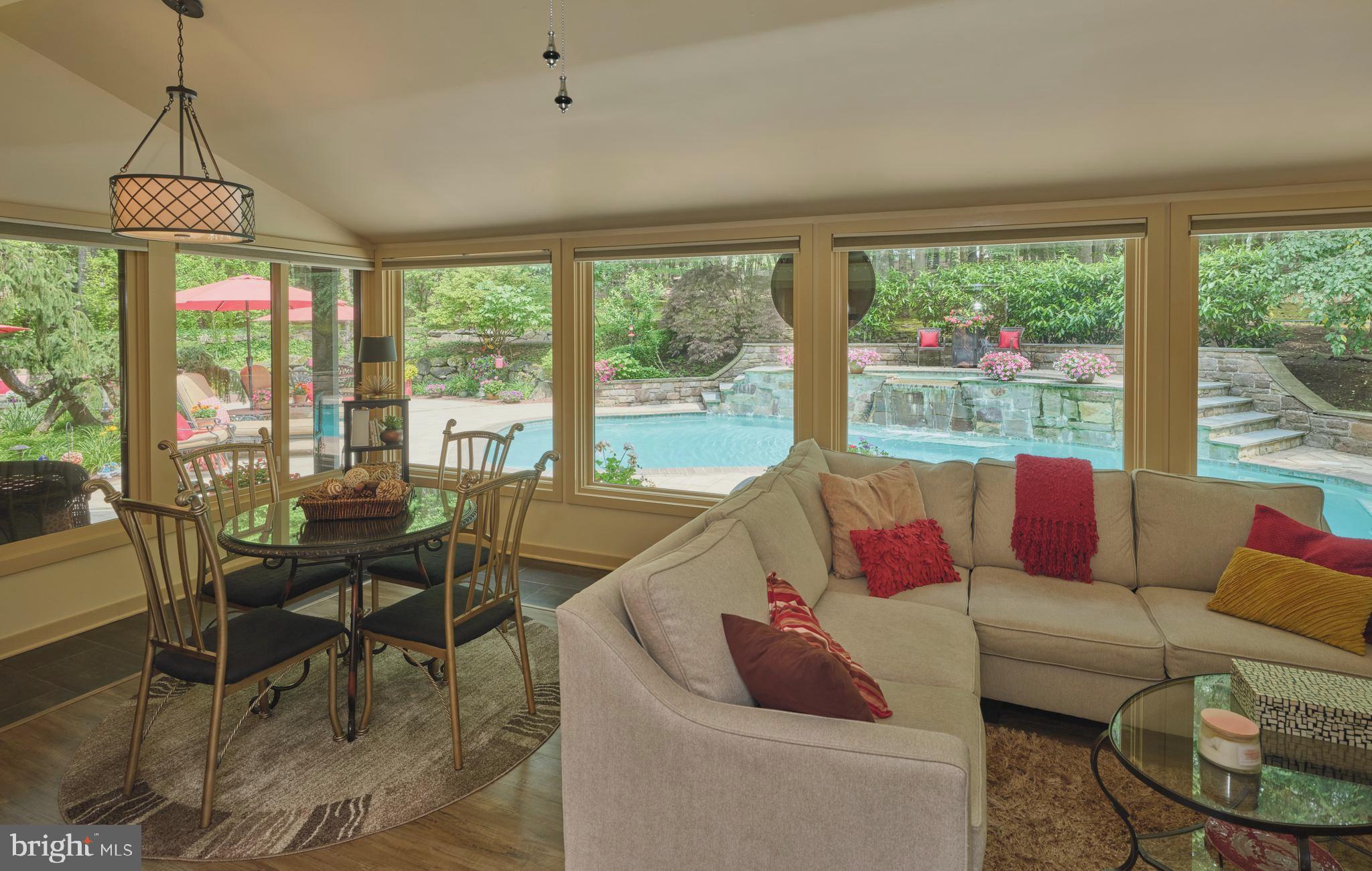 7028 Ely Road New Hope, PA 18938 - Photo 16 of 65 a living room with furniture and a large window