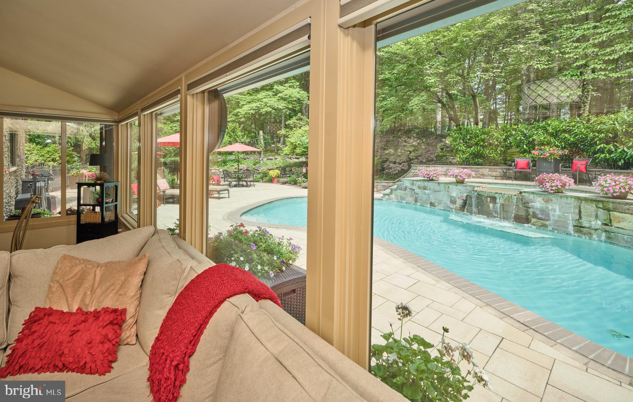 7028 Ely Road New Hope, PA 18938 - Photo 18 of 65 a view of a porch with furniture and garden