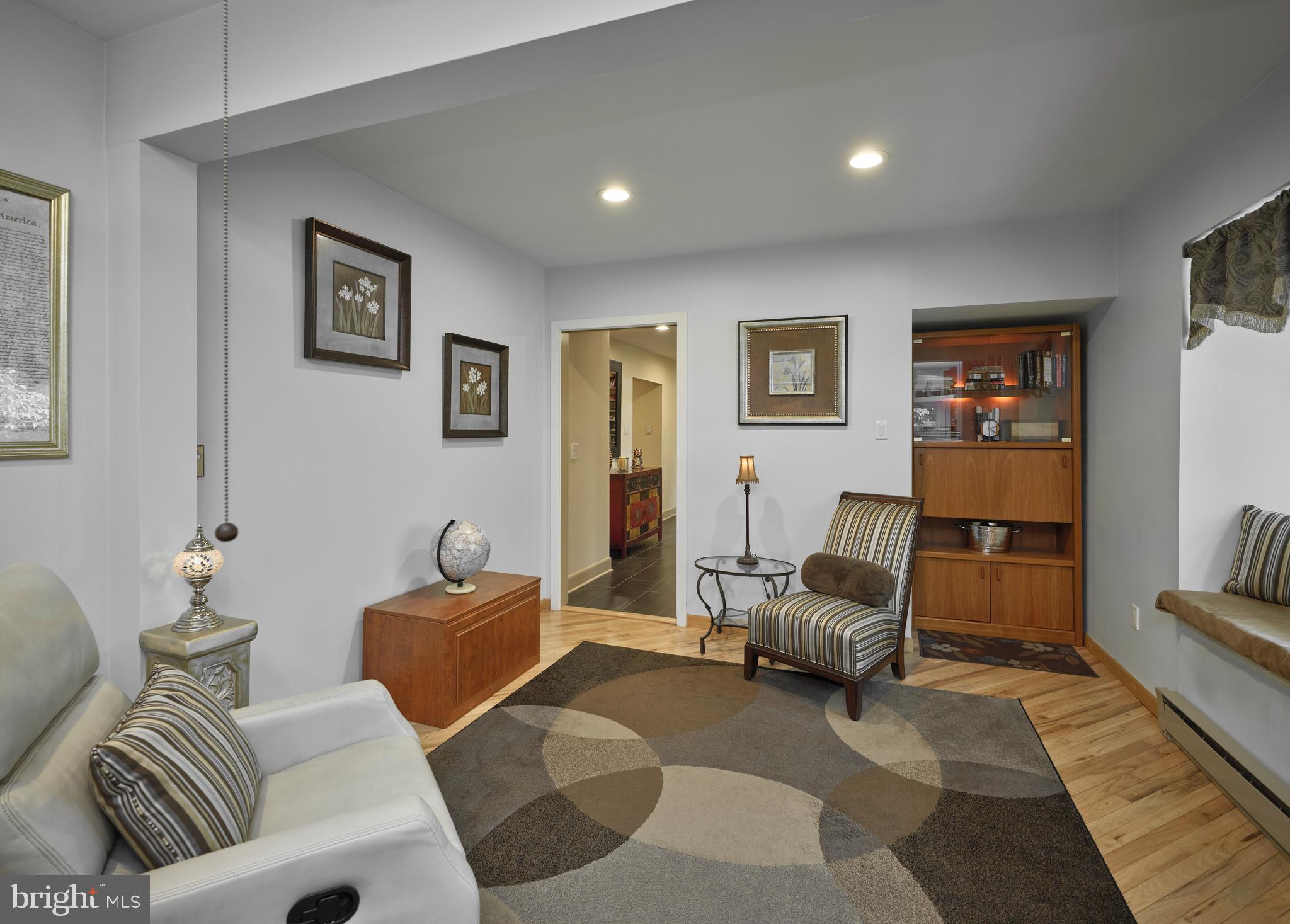 7028 Ely Road New Hope, PA 18938 - Photo 23 of 65 a living room with furniture and a rug