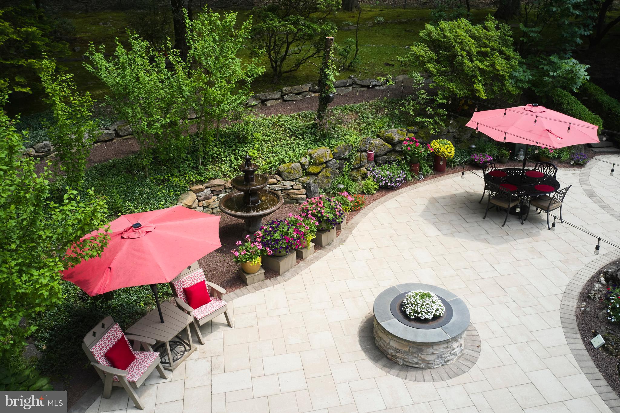 7028 Ely Road New Hope, PA 18938 - Photo 34 of 65 a view of a chairs and table in backyard