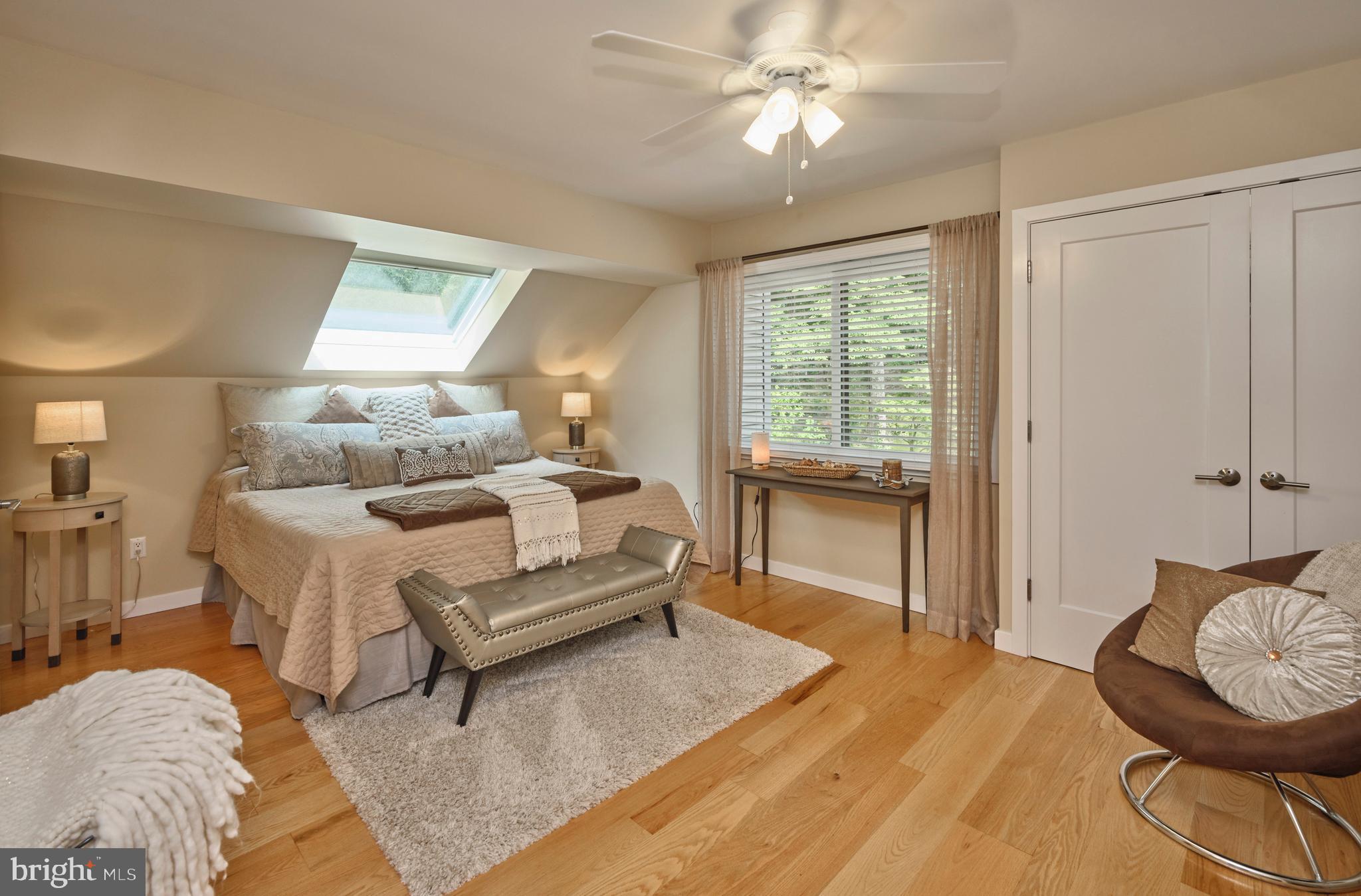 7028 Ely Road New Hope, PA 18938 - Photo 37 of 65 a living room with furniture and a large window
