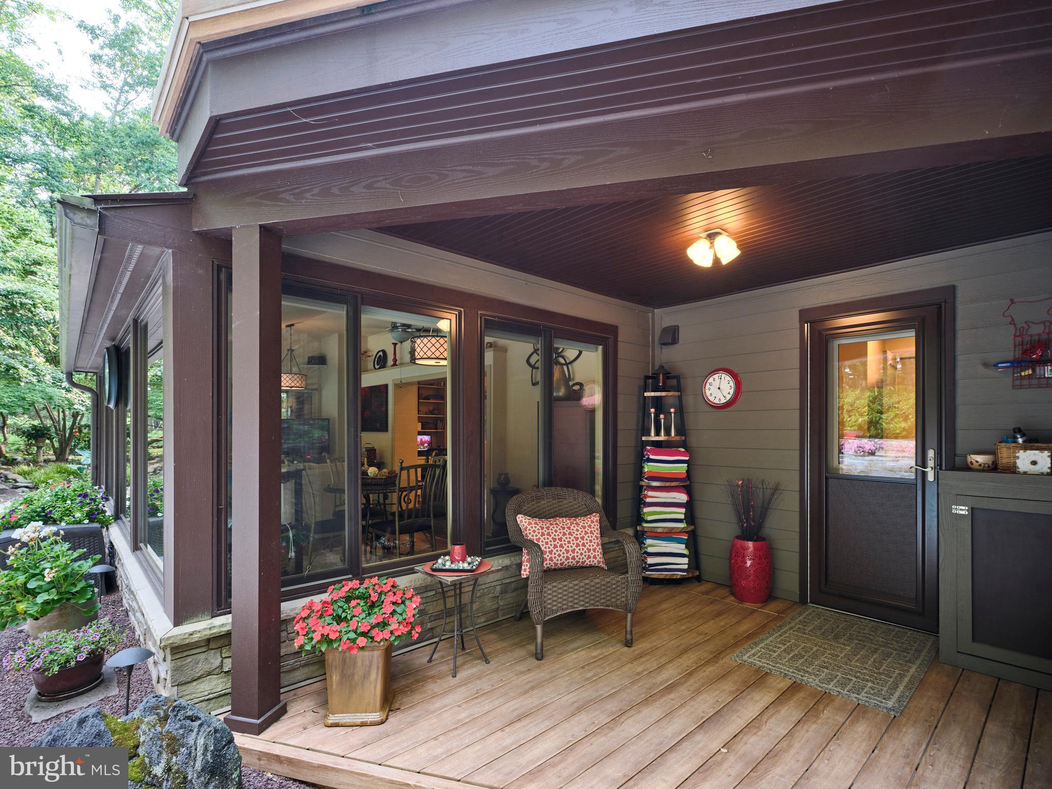 7028 Ely Road New Hope, PA 18938 - Photo 42 of 65 a living room with furniture and a potted plant