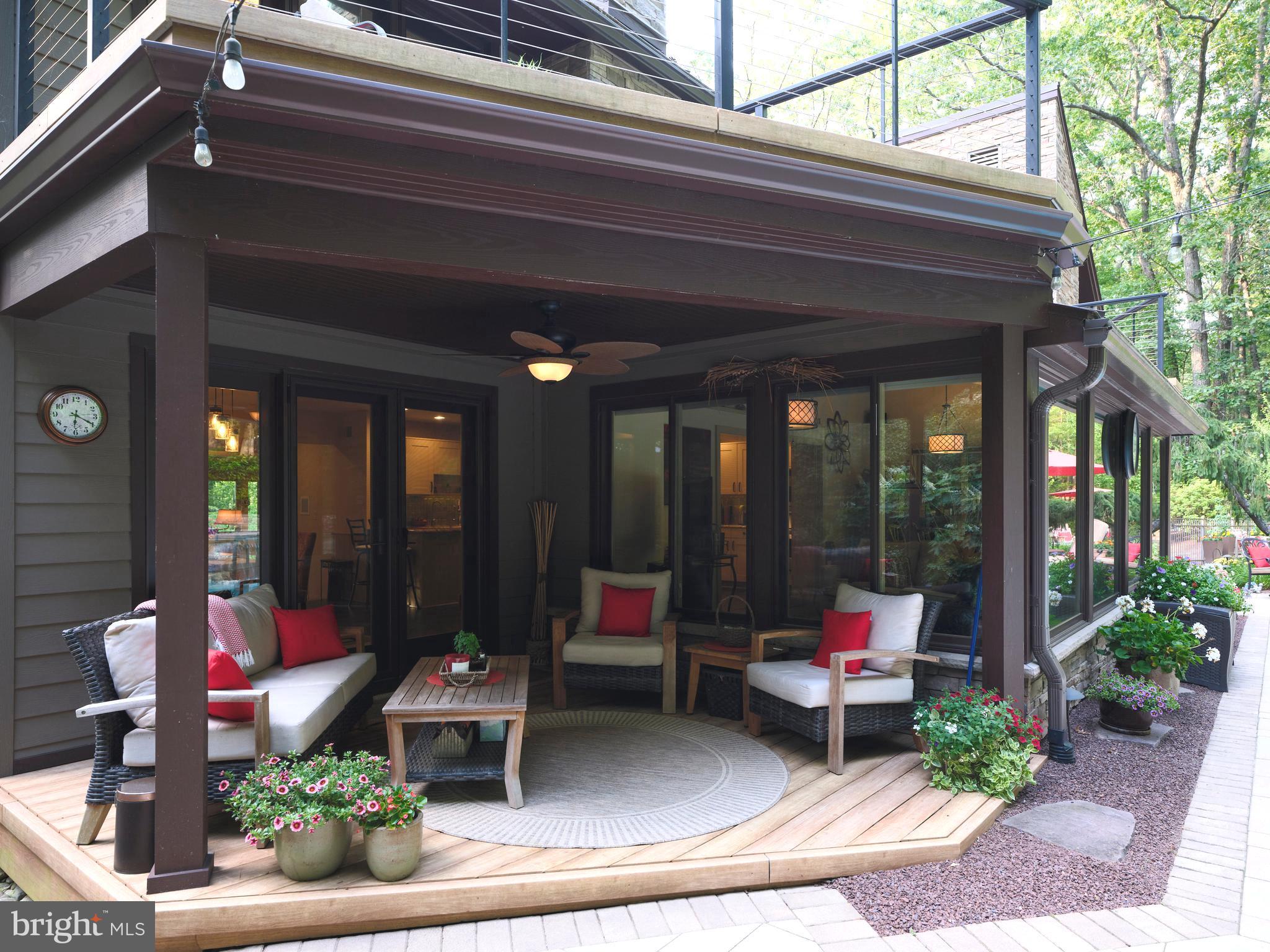 7028 Ely Road New Hope, PA 18938 - Photo 43 of 65 a building outdoor space with patio furniture and potted plants