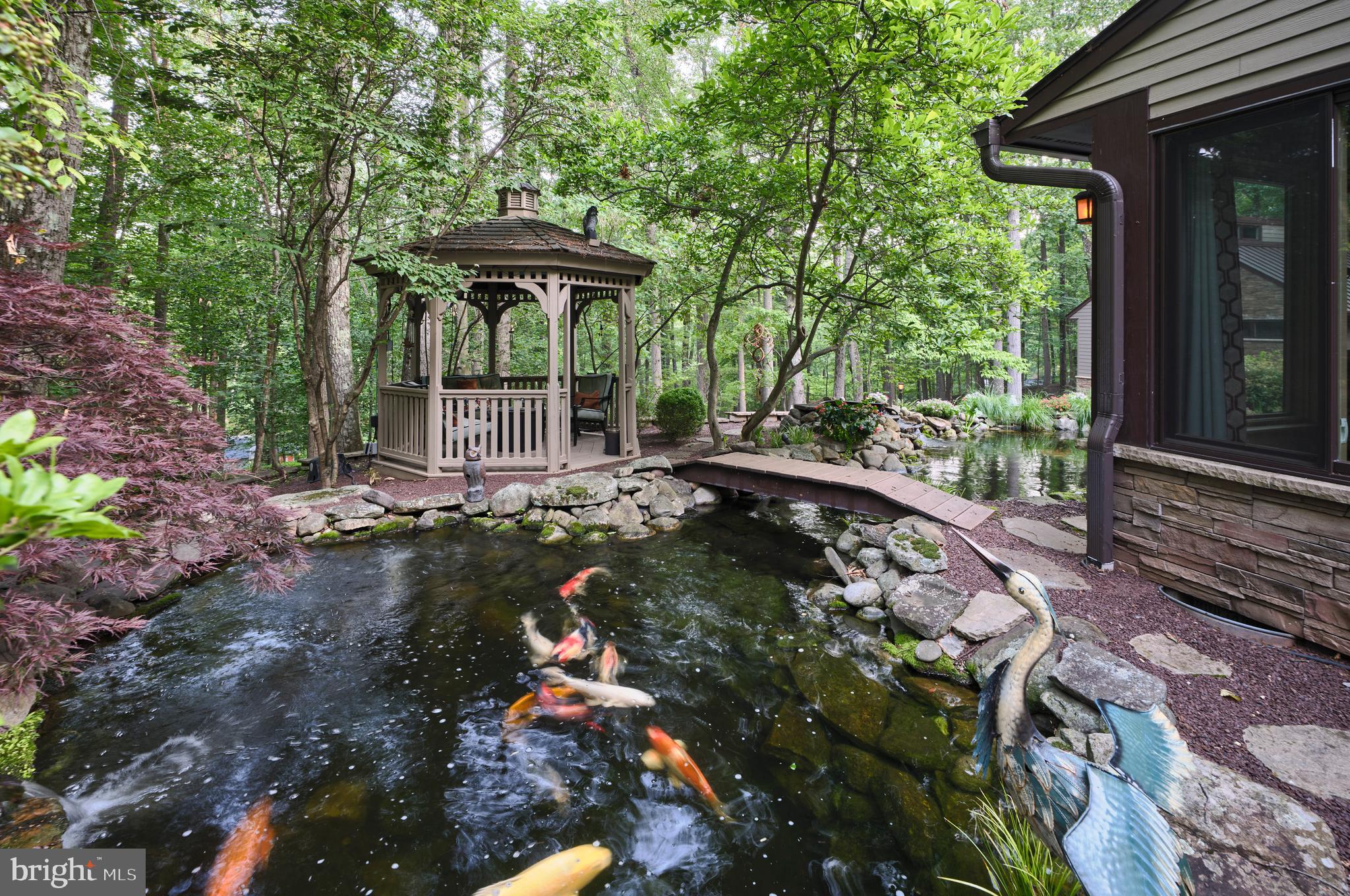 7028 Ely Road New Hope, PA 18938 - Photo 50 of 65 a view of a backyard with garden
