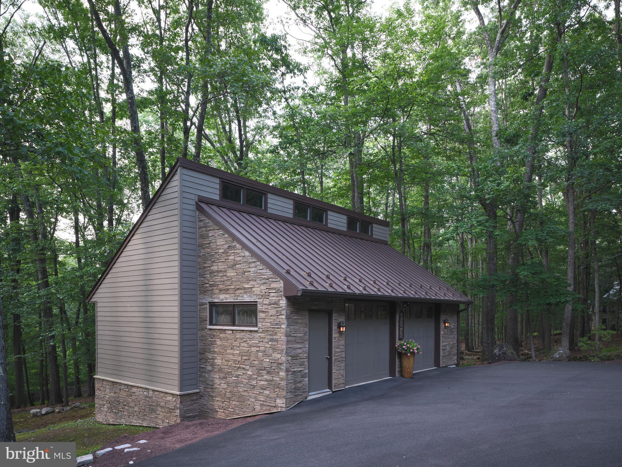 7028 Ely Road New Hope, PA 18938 - Photo 52 of 65 a view of a house with a backyard