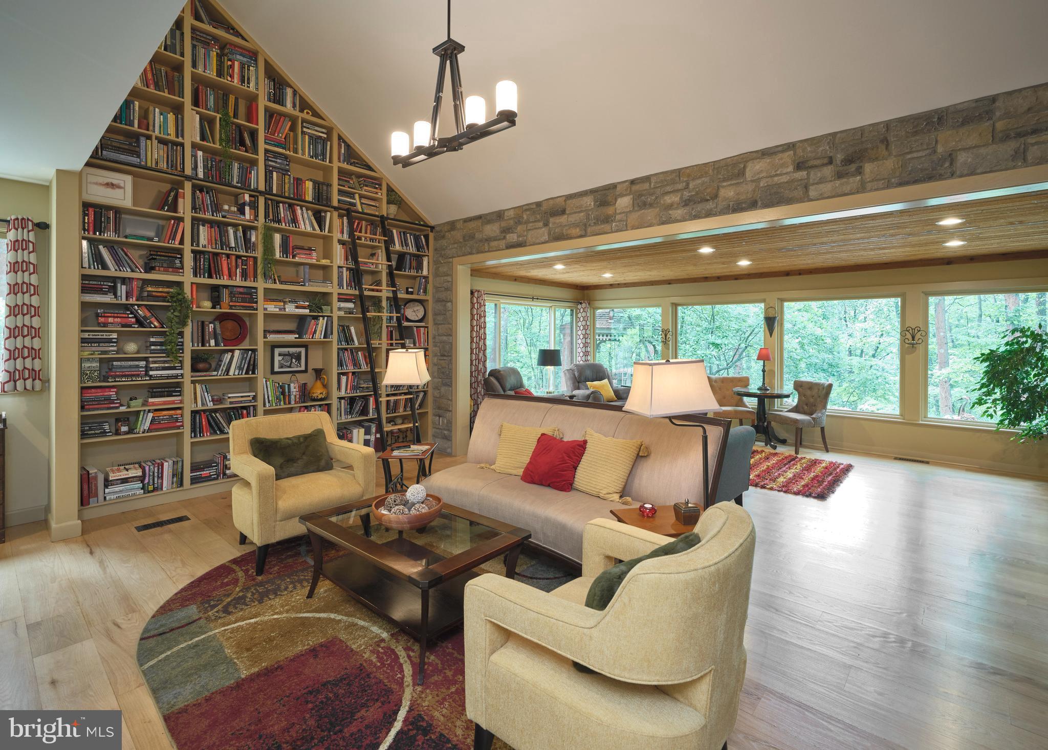 7028 Ely Road New Hope, PA 18938 - Photo 6 of 65 a living room with furniture and a large window