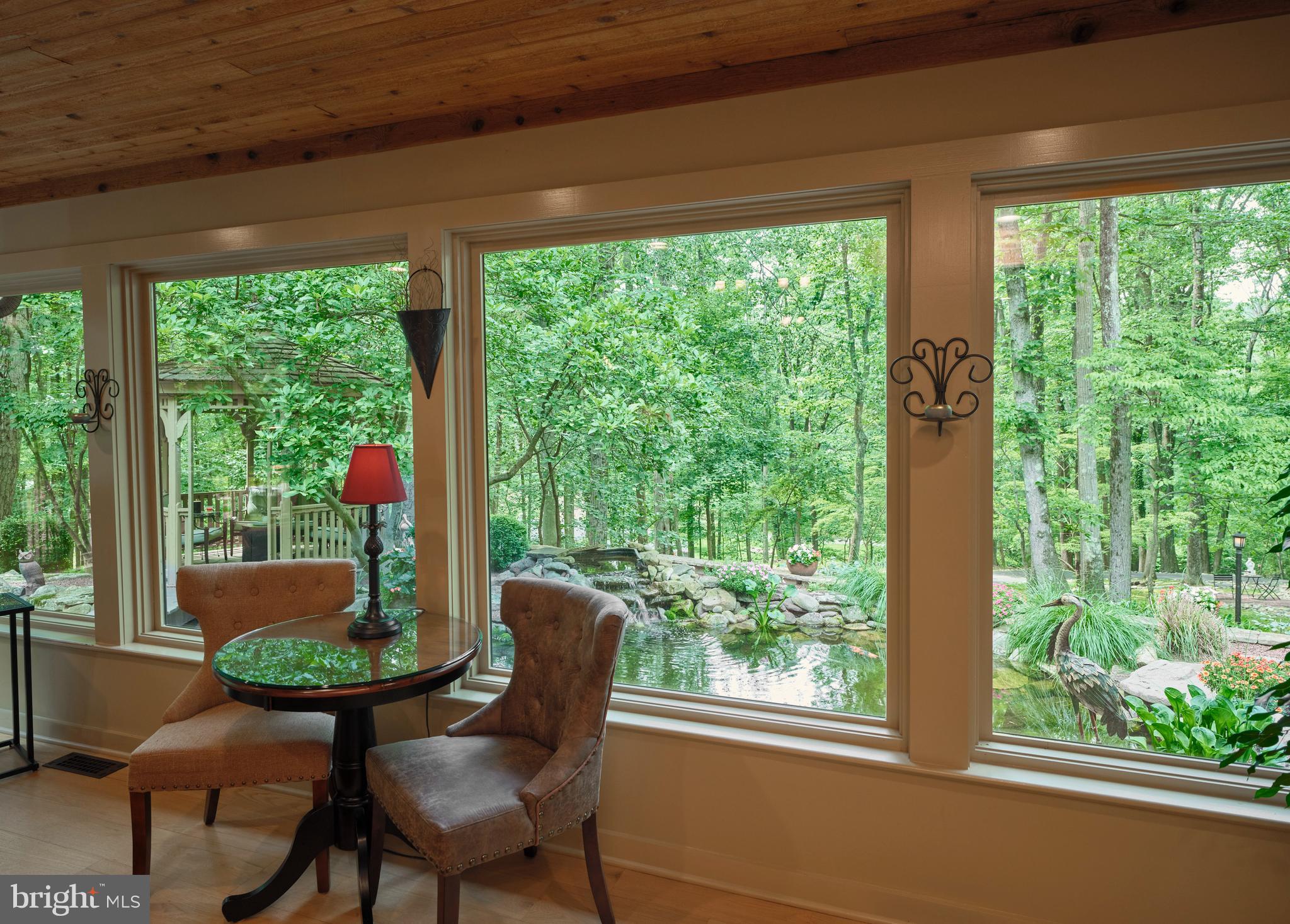 7028 Ely Road New Hope, PA 18938 - Photo 9 of 65 a view of a room with furniture and a large window