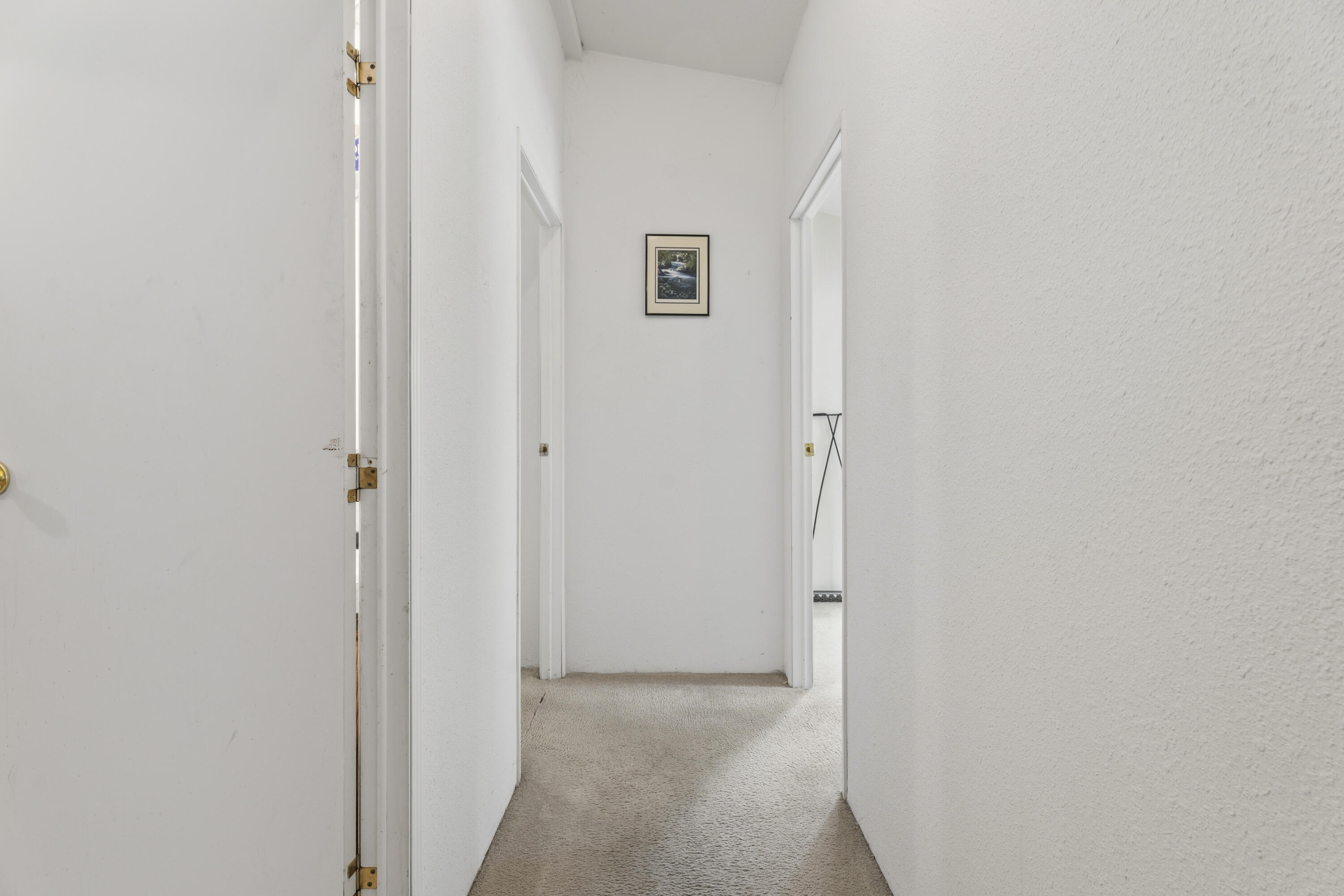 16928 Covina Road Bend, OR 97707 - Photo 18 of 48 a view of a hallway with closet