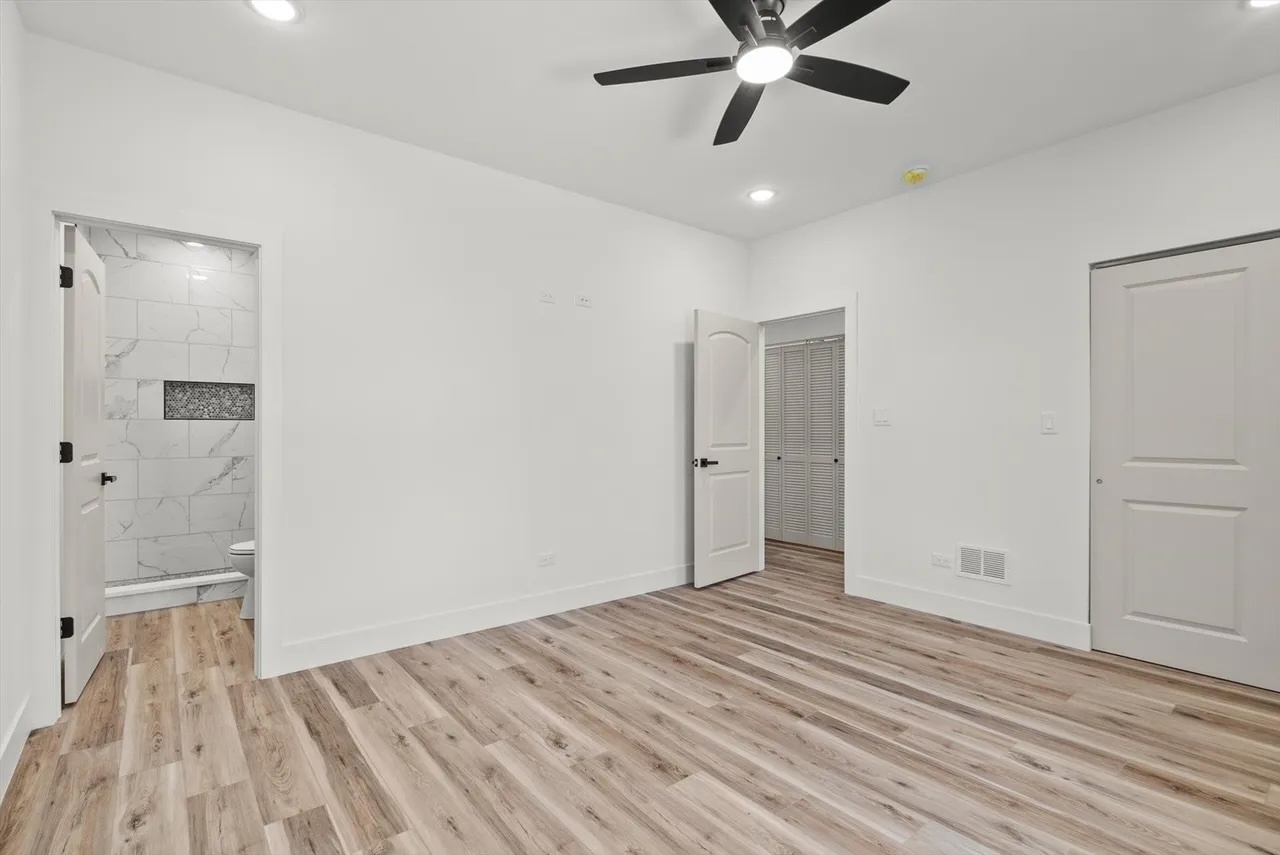 6538 South Rhodes Avenue, Unit 2 Chicago, IL 60637 - Photo 4 of 6 a view of a livingroom with a hardwood floor