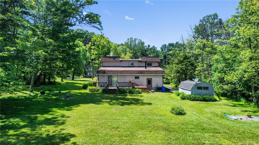 234 Sky Top Road Acme, PA 15610 - Photo 18 of 19 a view of a house with a backyard porch and sitting area