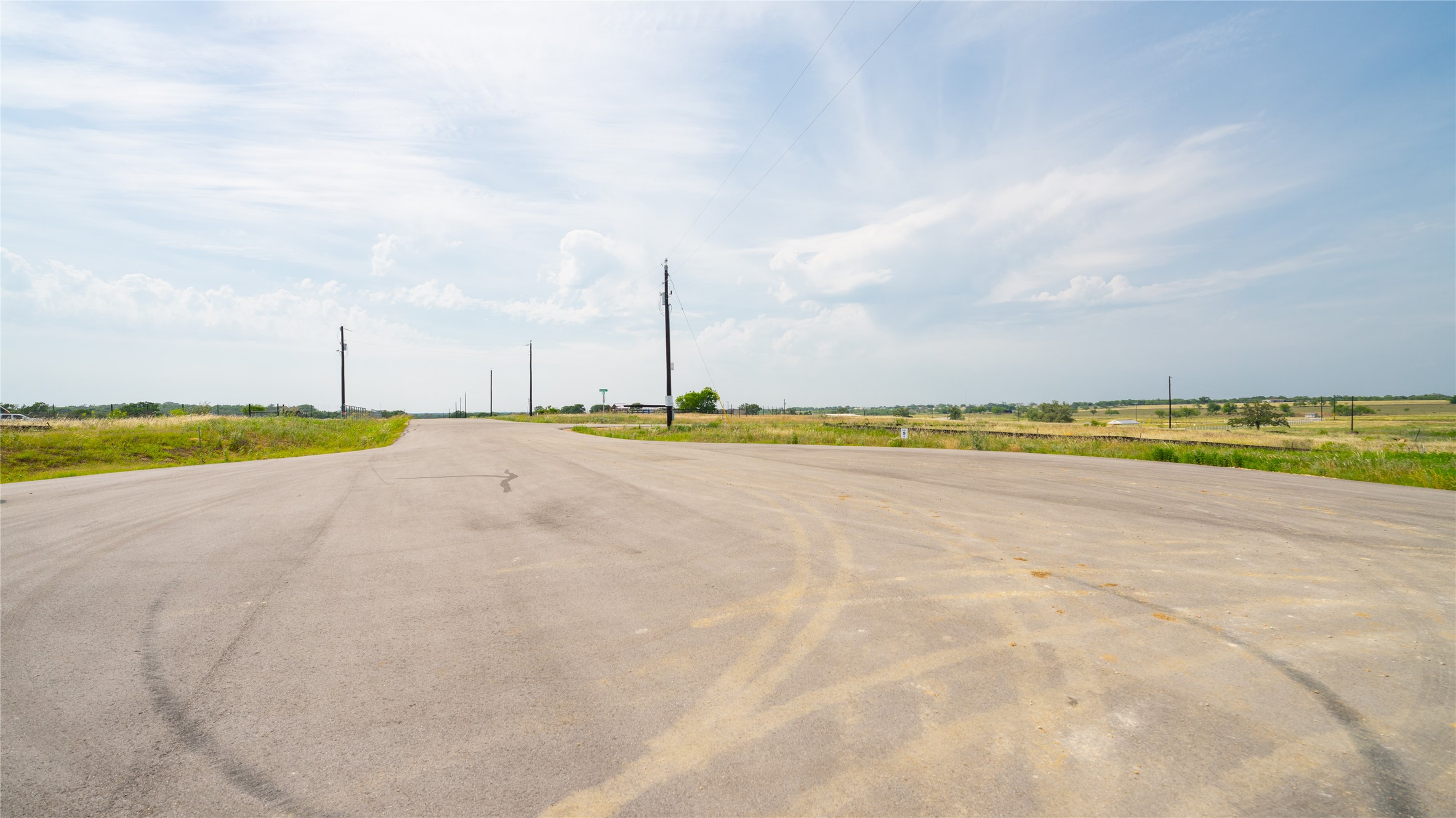 1350 Ferguson Loop Dale Dale, TX 78616 - Photo 5 of 5 View of asphalt street