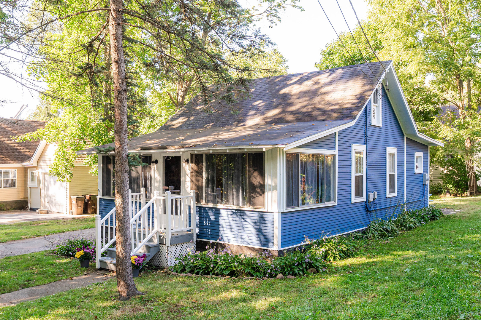 front view of a house with a yard