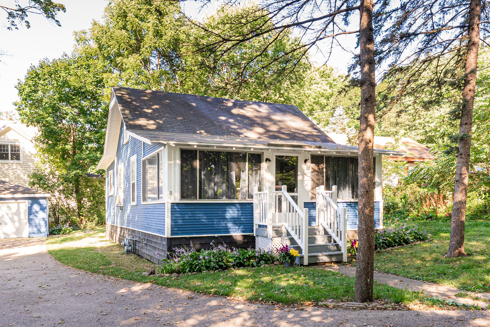 8415 Balder Drive Cary, IL 60013 - Photo 2 of 34 a front view of a house with garden