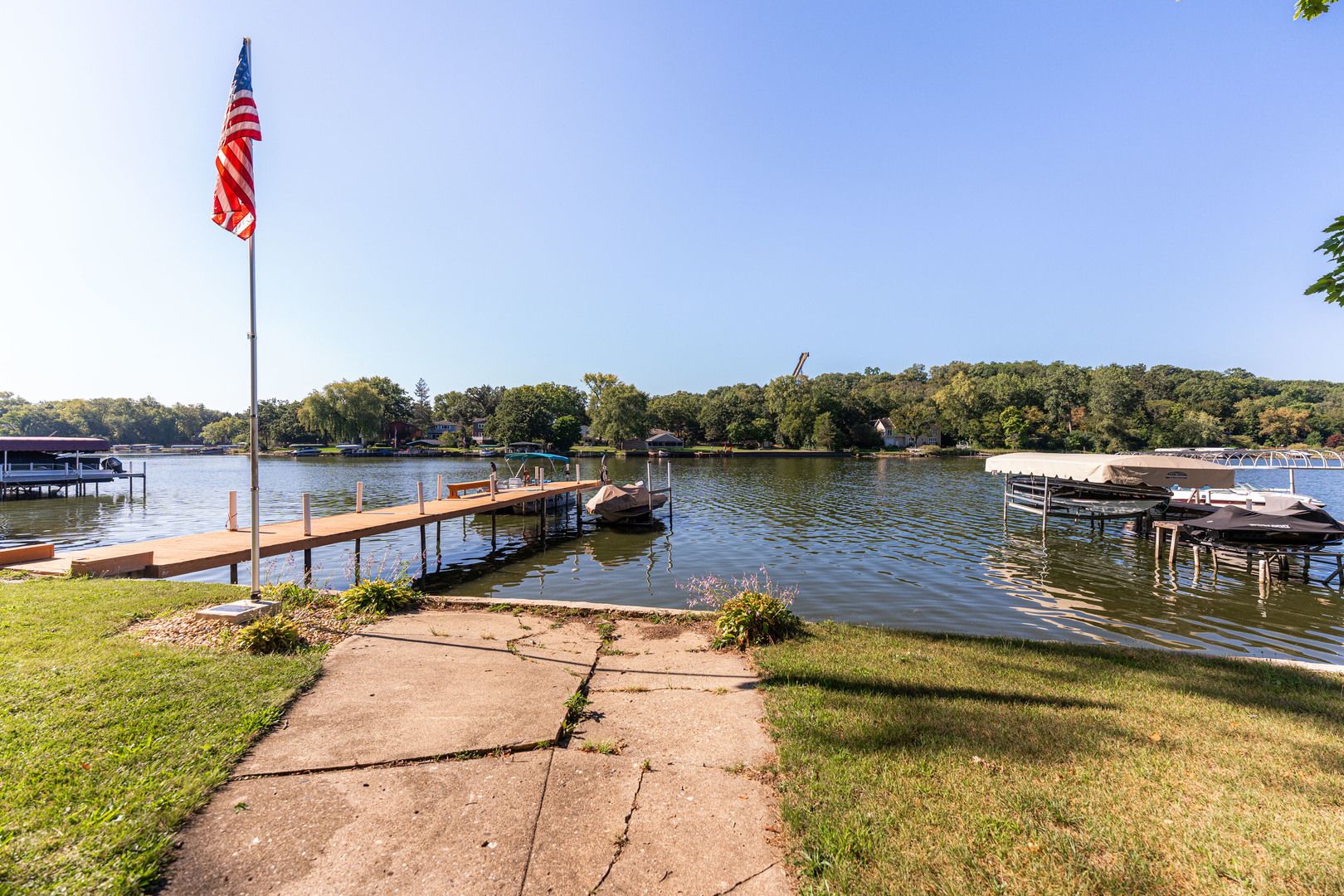 8415 Balder Drive Cary, IL 60013 - Photo 33 of 34 a view of a lake with chairs