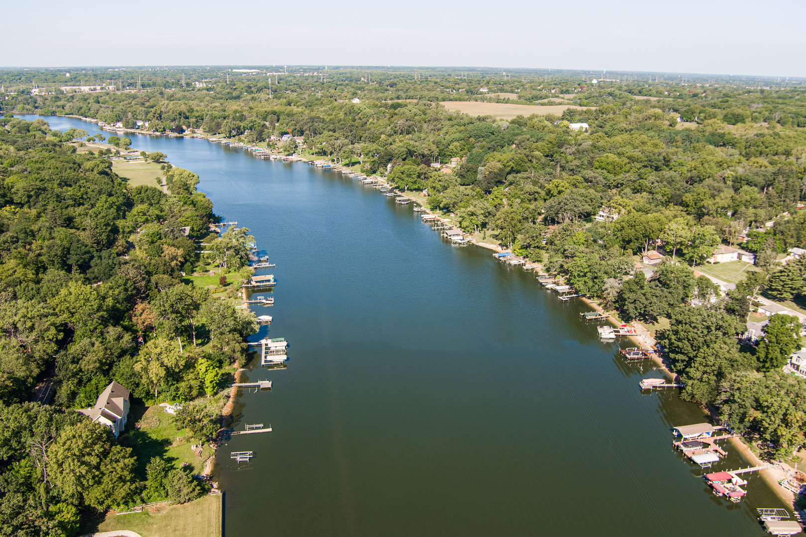 8415 Balder Drive Cary, IL 60013 - Photo 8 of 34 a view of a lake with a city