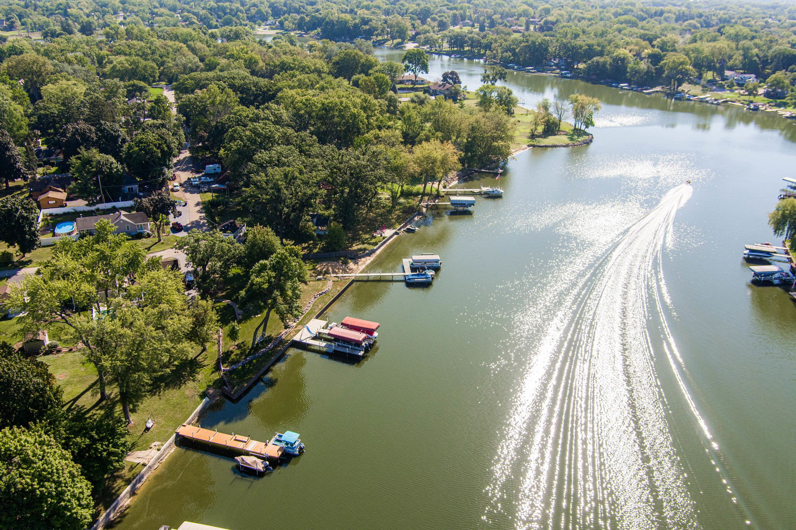 8415 Balder Drive Cary, IL 60013 - Photo 9 of 34 a view of a lake with a house