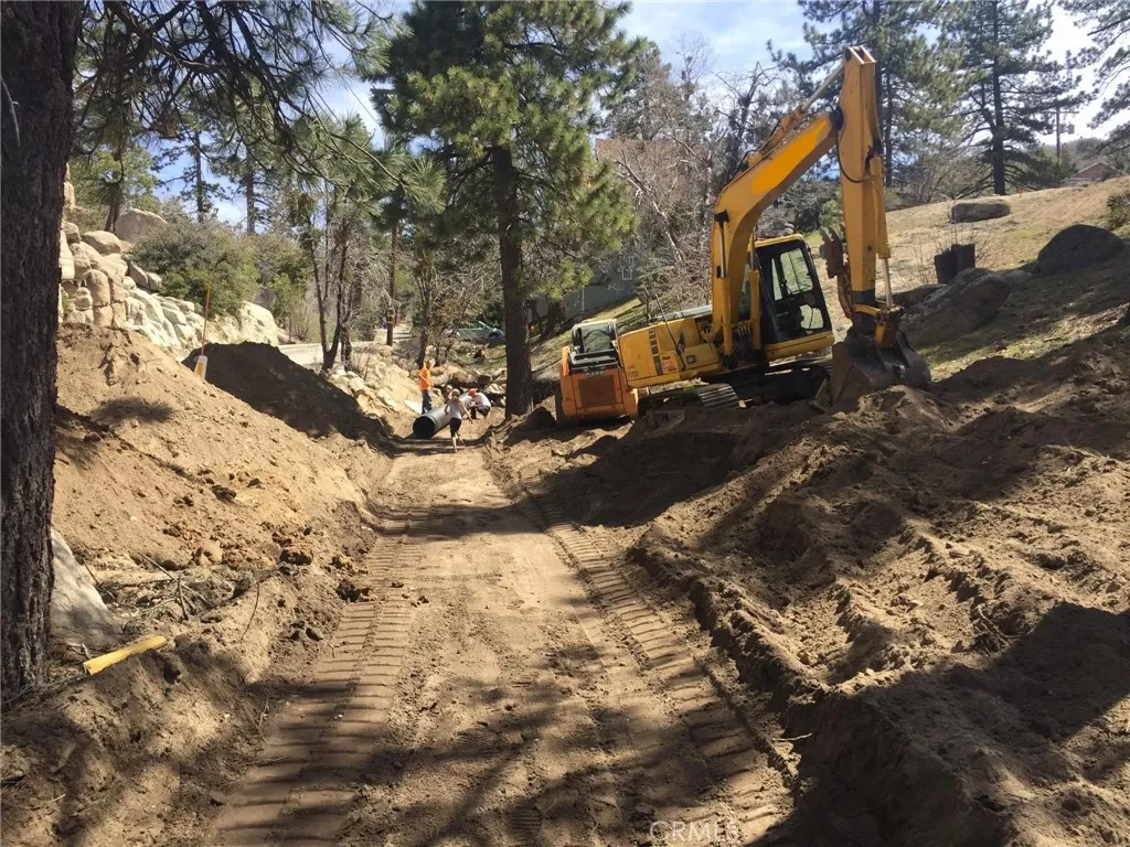 0 Garlock Running Springs, CA 92382 - Photo 10 of 11 a front view of a house with a yard covered in snow