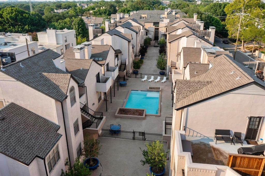 3901 Travis Street, Unit 113 Dallas, TX 75204 - Photo 12 of 40 an aerial view of multiple houses with yard
