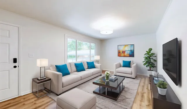 a view of a kitchen with refrigerator and sink