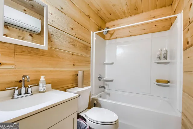 a bed room with a bed and a couch