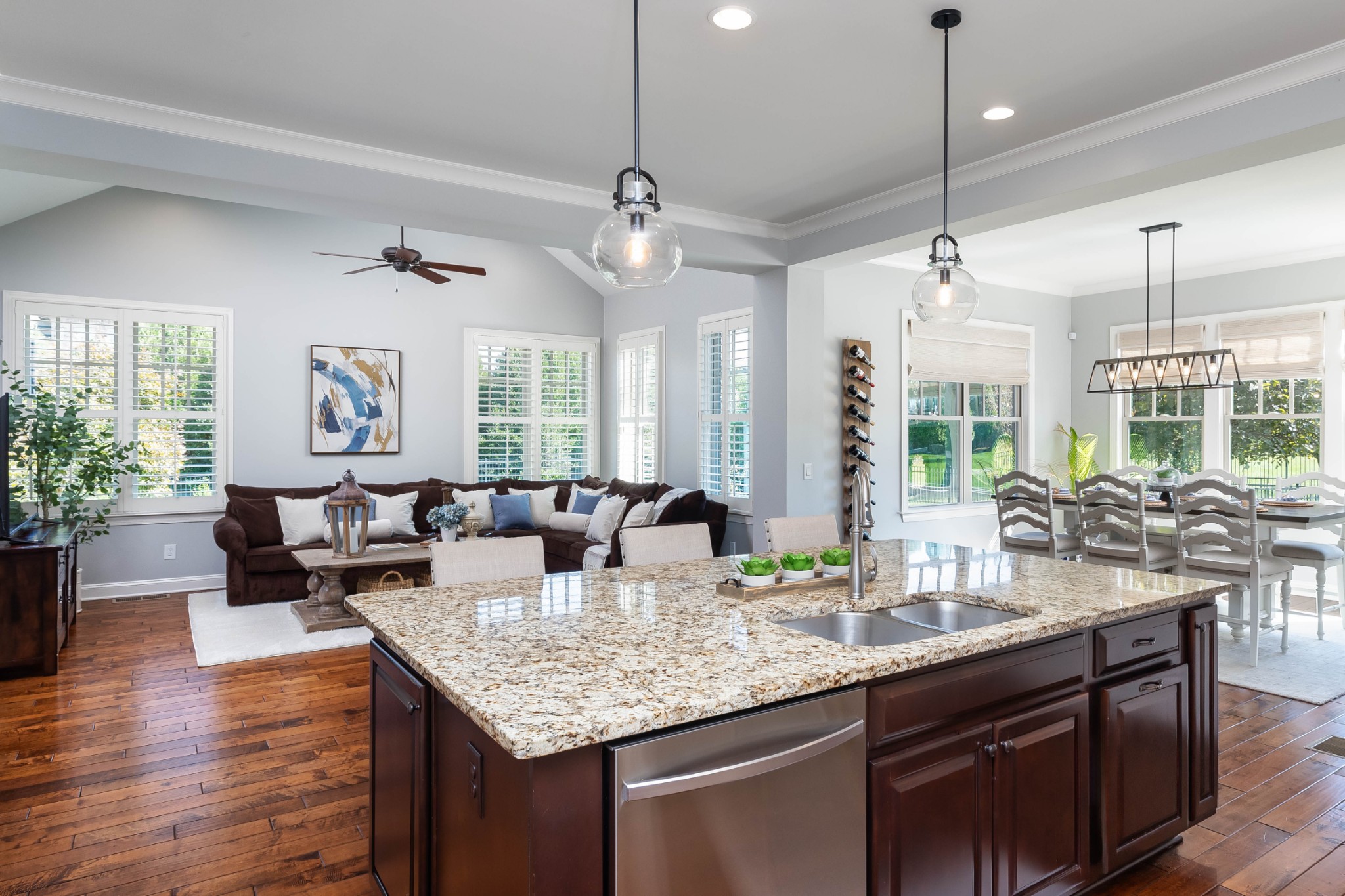 1828 Kettering Trace Brentwood, TN 37027 - Photo 20 of 62 a kitchen with lots of counter top space a sink appliances and living room view