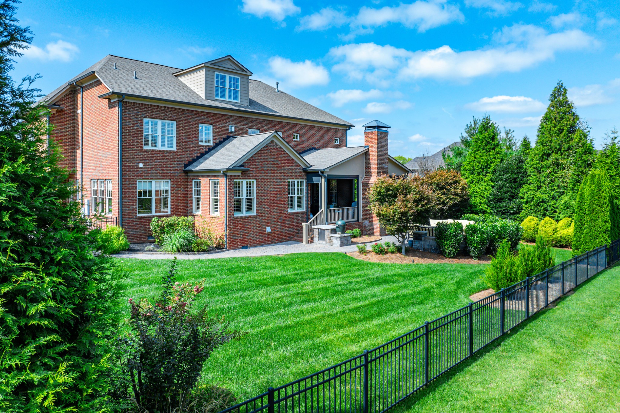 1828 Kettering Trace Brentwood, TN 37027 - Photo 53 of 62 a front view of a house with a yard