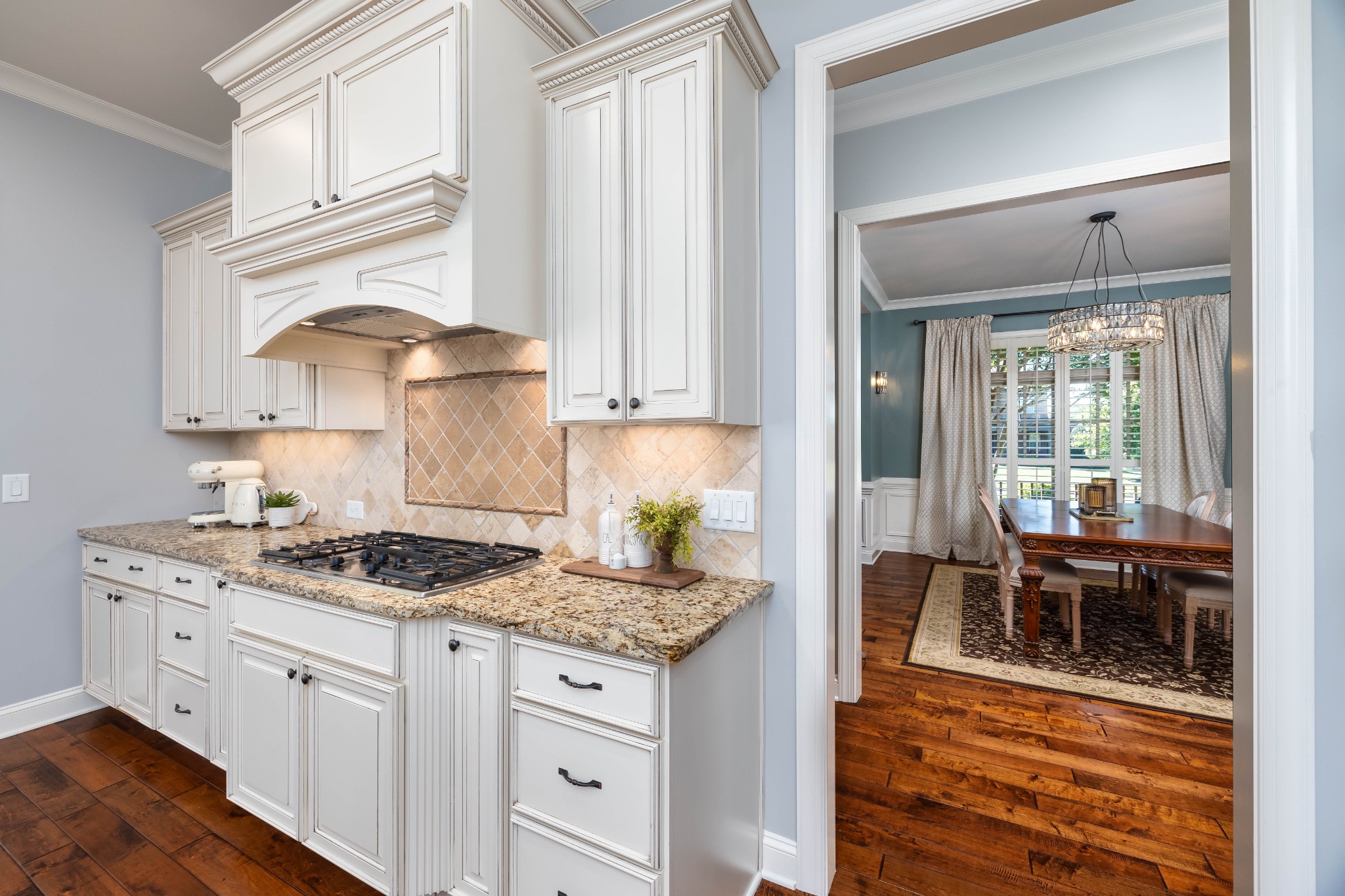 1828 Kettering Trace Brentwood, TN 37027 - Photo 8 of 62 a kitchen with granite countertop cabinets stainless steel appliances and a dining table