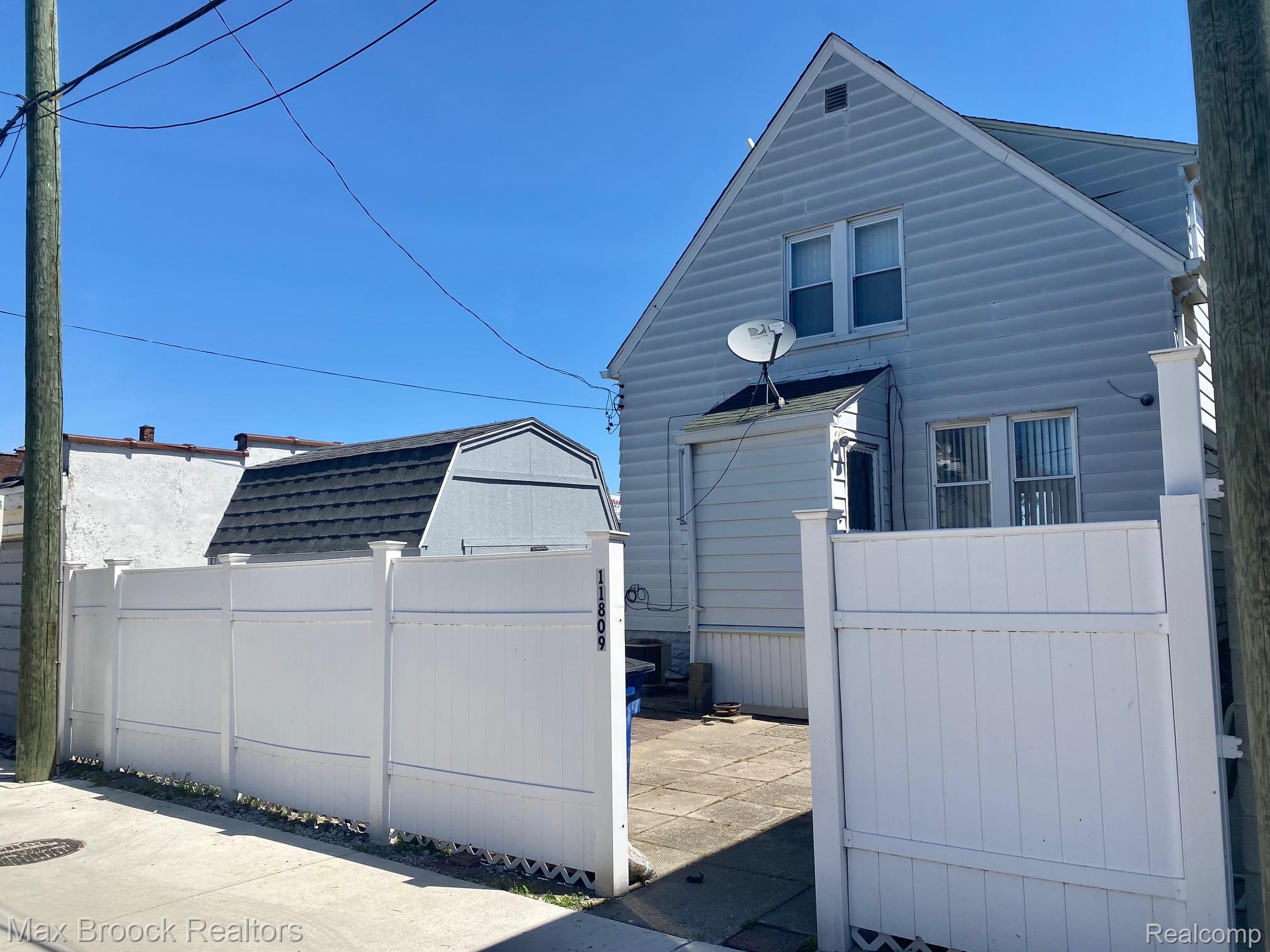 11809 Conant Hamtramck, MI 48212 - Photo 10 of 13 Fenced yard with rear alley access, the road was recently redone