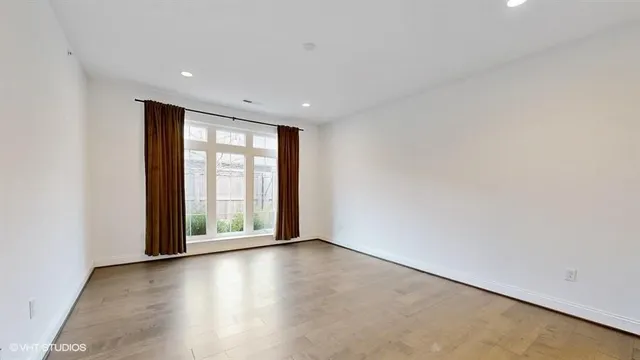 a view of a chairs and table in the patio