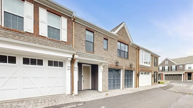 a bedroom with furniture and a fireplace