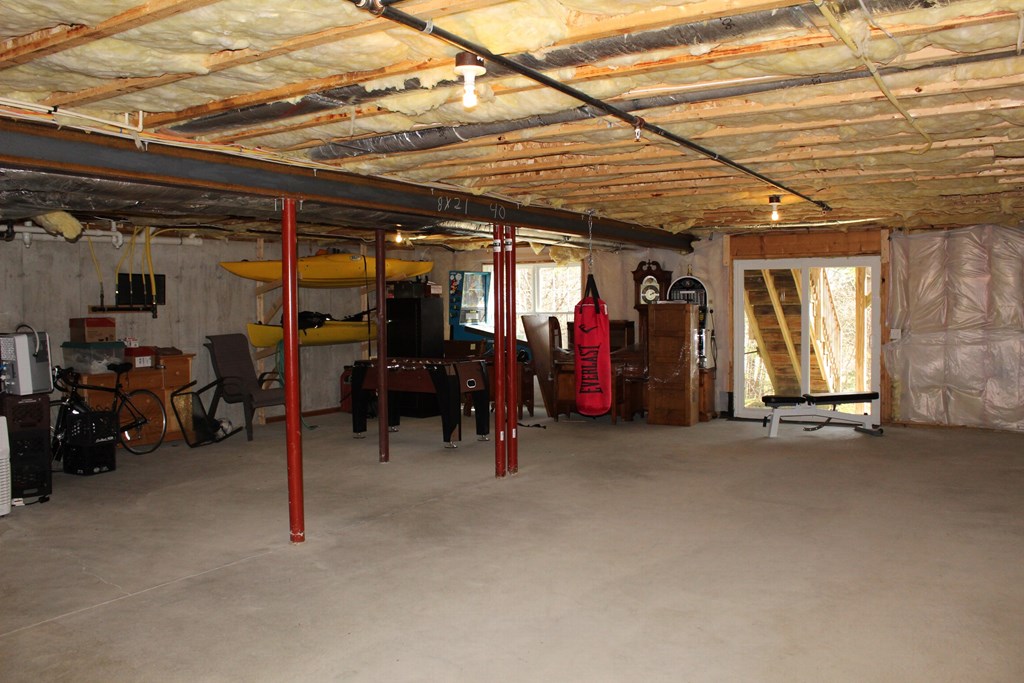 101 Buttercup Lane, Unit 101 Grafton, MA 01560 - Photo 23 of 24 a view of a big room with air conditioner duct and materials on the wall