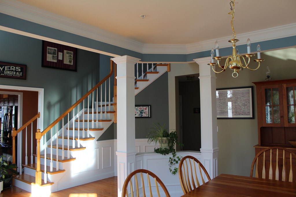 101 Buttercup Lane, Unit 101 Grafton, MA 01560 - Photo 8 of 24 a view of entryway and hall with wooden floor