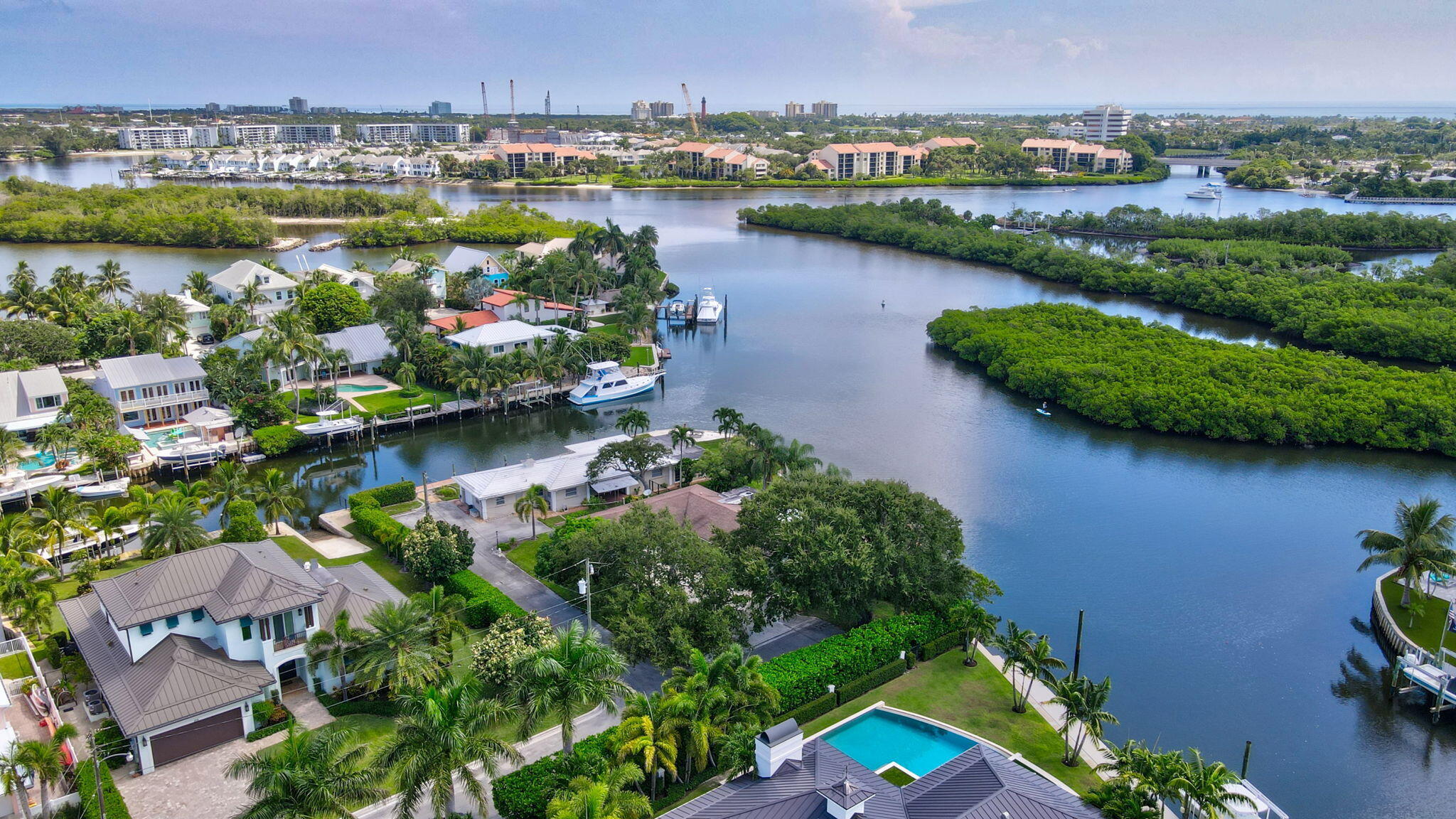 207 Body Court, Unit PARCEL 1 Jupiter, FL 33477 - Photo 5 of 9 an aerial view of lake residential houses with outdoor space and lake view