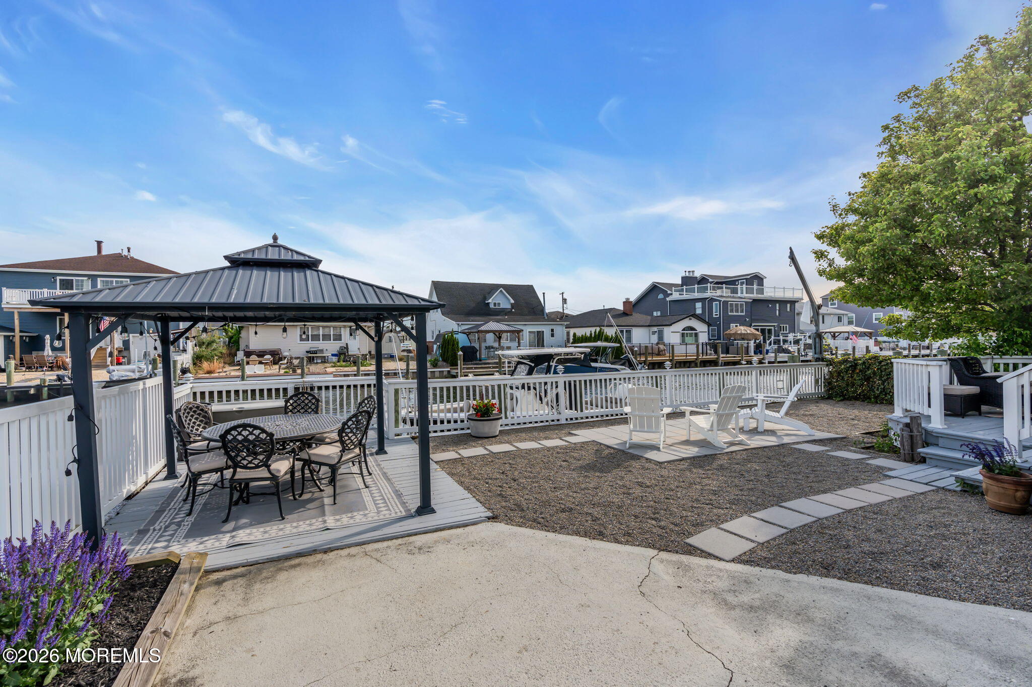 29 Green Island Road Toms River, NJ 08753 - Photo 44 of 63 a view of a patio with a table and chairs