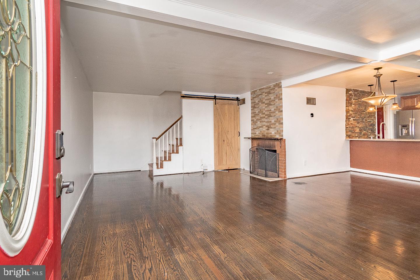 10168 Verree Road Philadelphia, PA 19116 - Photo 7 of 35 a view of an empty room with wooden floor and a window