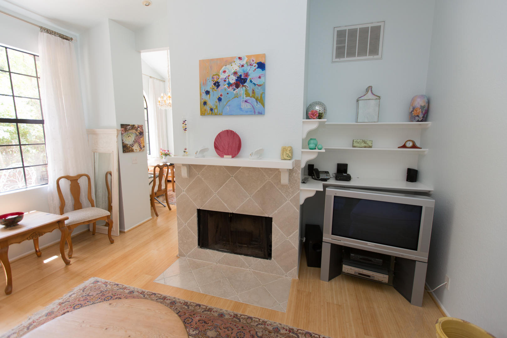 5300 Traci Drive Santa Barbara, CA 93111 - Photo 5 of 13 a living room with furniture and a fireplace