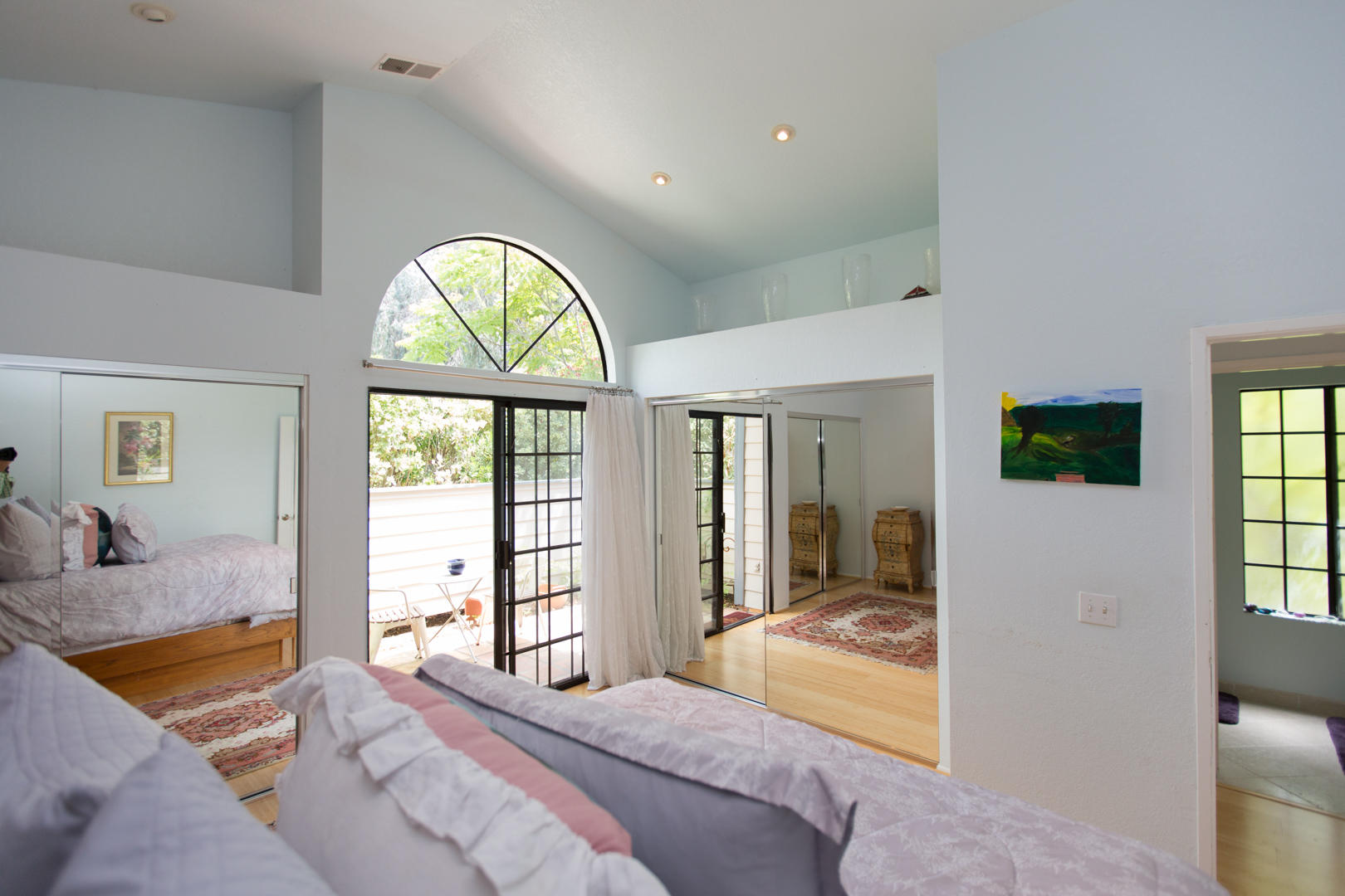 5300 Traci Drive Santa Barbara, CA 93111 - Photo 10 of 13 a bedroom with a bed and a large window