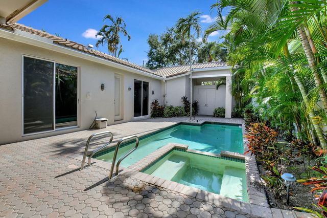 a view of backyard of a house